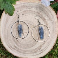 Kyanite earrings wire wrapped onto silver hoops.
