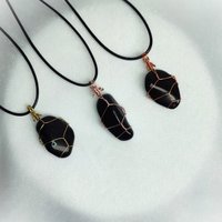 Obsidian wire wrapped pendant in gold, rose gold or copper.