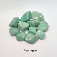 Crystal set for female empowerment with amazonite, hematite, moonstone and information card.
