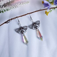 Butterfly earrings with glass crystal drops.
