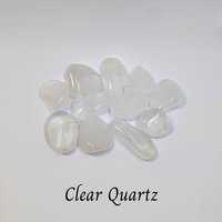 Crystal set for new beginnings with malachite, quartz, red jasper, orange calcite and information card.