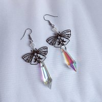 Butterfly earrings with glass crystal drops.
