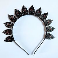 Halo crowns with filigree teardrops in silver, gold or black.