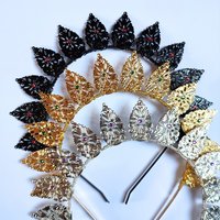 Halo crowns with filigree teardrops in silver, gold or black.