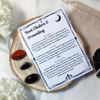 Crystal set for the root chakra with red jasper, hematite, smokey quartz and information card.