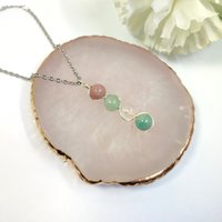 Gemstone beaded pendant with rhodochrosite, green aventurine, rose quartz and amazonite.