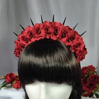 Bella Rose headband with red flowers and black spikes.
