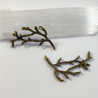 Bronze branch connector charms .