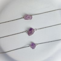 Raw amethyst cluster choker-style necklace with chain.