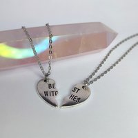 Best Witches heart shaped silver pendant with chain.