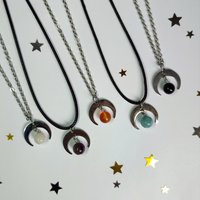 Silver moon pendant with gemstone beads.