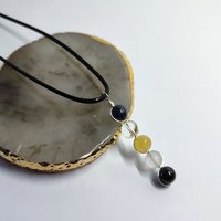 Libra pendant with lapis lazuli,  quartz, citrine, rose quartz and garnet.