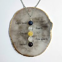 Libra pendant with lapis lazuli,  quartz, citrine, rose quartz and garnet.