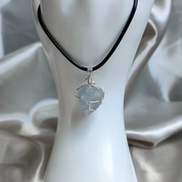 Raw celestite pendant wrapped in silver plated wire