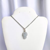 Raw celestite pendant wrapped in silver plated wire