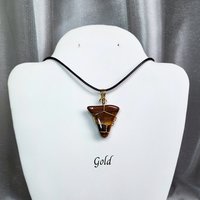 Tiger's eye wire wrapped pendant in gold, rose gold or copper.