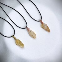 Citrine wire wrapped pendant in gold, rose gold or copper with cord.