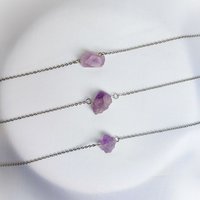 Raw amethyst cluster choker-style necklace with chain.