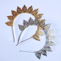 Halo crowns with filigree teardrops in silver, gold or black.