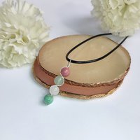 Gemstone beaded pendant with rhodochrosite, green aventurine, rose quartz and amazonite.