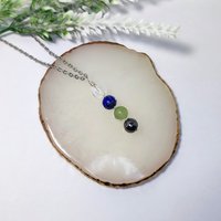 Study and exams gemstone pendant with quartz, lapis lazuli, fluorite and hematite with chain or cord.
