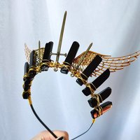 Valkyrie crown with black agate, bronze swords and gold filigree wings wire wrapped onto a headband.
