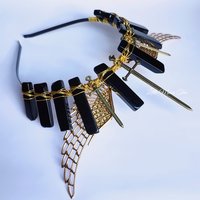 Valkyrie crown with black agate, bronze swords and gold filigree wings wire wrapped onto a headband.