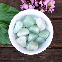 Green aventurine polished tumblestone.