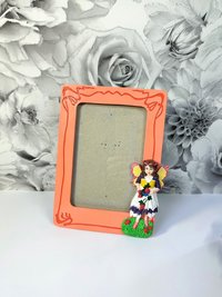 Refurbished photo frame with fairy decoration for adults or children.