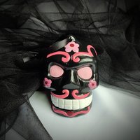 Day of the Dead pink and black sugar skull hanging ornament.