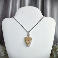 Moonstone wire wrapped pendant in silver.