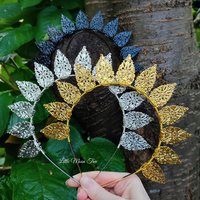 Halo crowns with filigree teardrops in silver, gold or black.