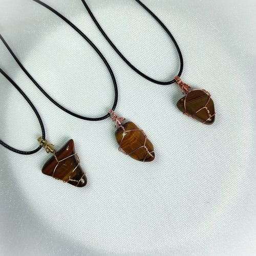Tiger's eye wire wrapped pendant in gold, rose gold or copper with chain or cord.
