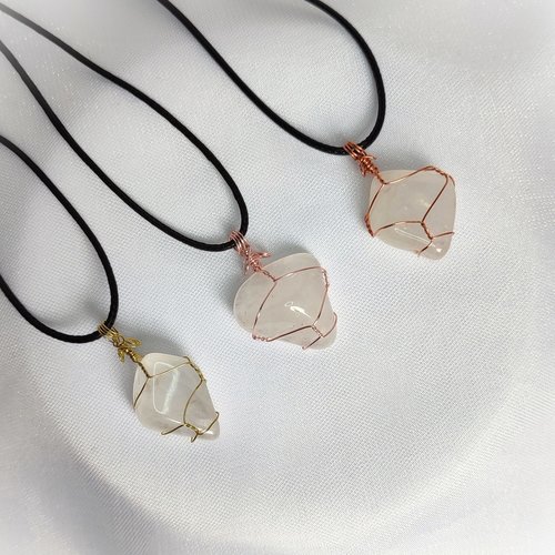Quartz tumblestone wrapped in gold, rose gold or copper wire.