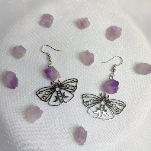 Silver butterfly drop earrings with raw amethyst clusters.