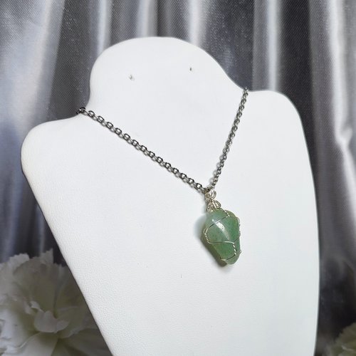 Green aventurine wire wrapped pendant in silver.