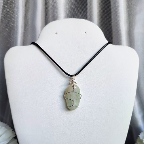 Green aventurine wire wrapped pendant in silver.