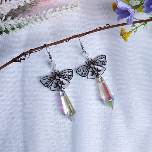 Butterfly earrings with glass crystal drops.