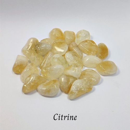 Pile of citrine tumblestones.