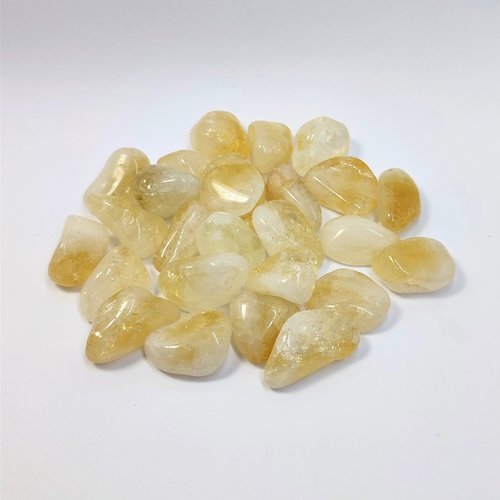 Citrine polished tumblestone.