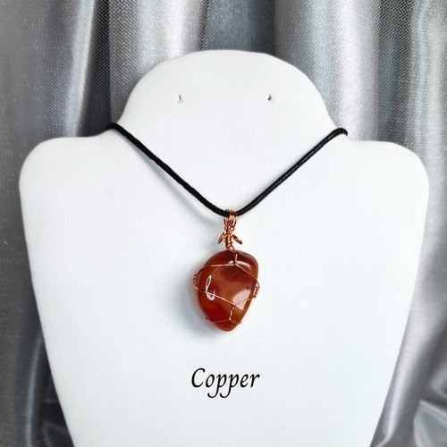 Carnelian tumblestone wrapped in gold, rose gold or copper wire.