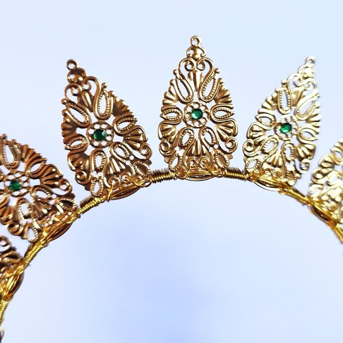 Halo crowns with filigree teardrops in silver, gold or black.