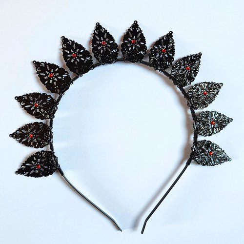 Halo crowns with filigree teardrops in silver, gold or black.