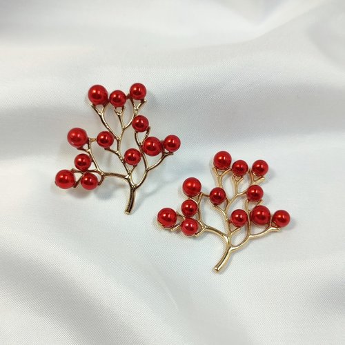 Gold branch charms with red faux pearl beads.