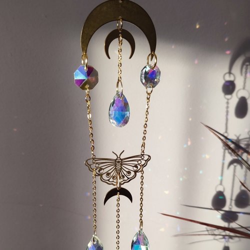 Crystal suncatcher with brass moons, butterflies and AB glass crystals.
