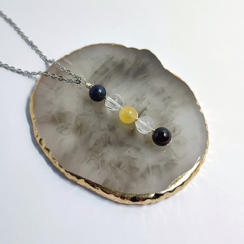 Libra pendant with lapis lazuli,  quartz, citrine, rose quartz and garnet.
