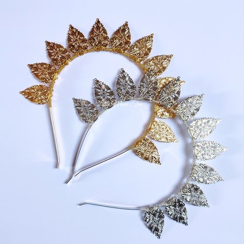 Halo crowns with filigree teardrops in silver, gold or black.