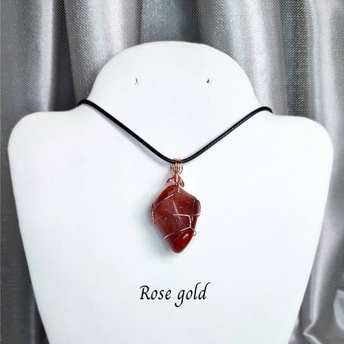 Carnelian tumblestone wrapped in gold, rose gold or copper wire.