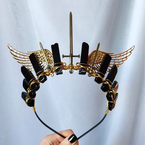 Valkyrie crown with black agate, bronze swords and gold filigree wings wire wrapped onto a headband.