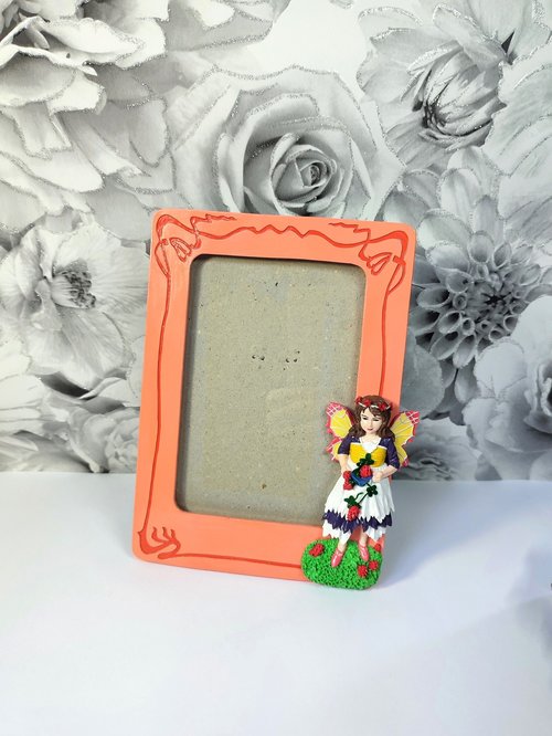 Refurbished photo frame with fairy decoration for adults or children.